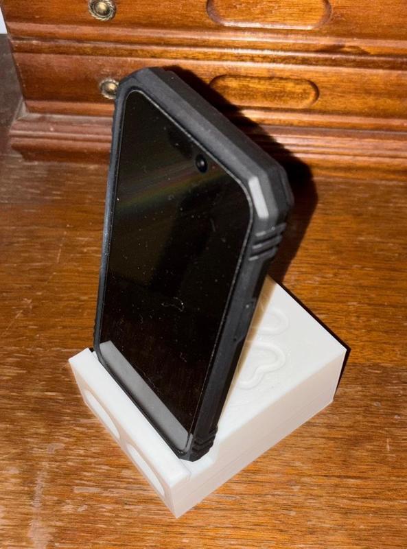 Iphone in case charger stand