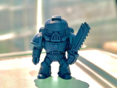 Cute SpaceMarine with chainsword