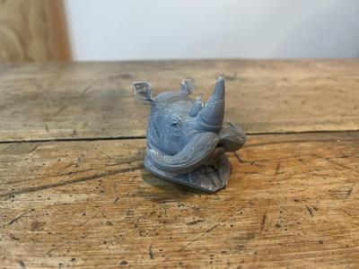 Rhino with a mustache and in a suit bust