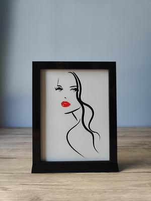 A Woman's Face Shadow Box E