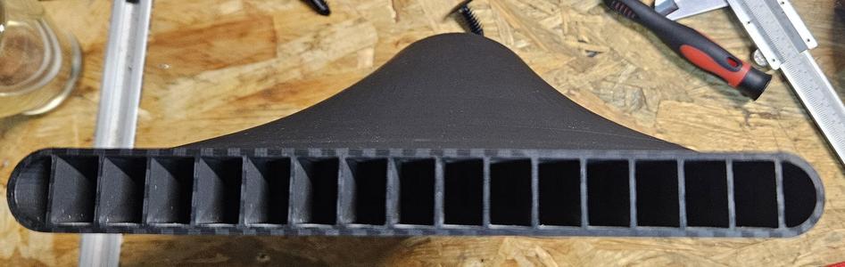 Garage door exhaust laser nozzle