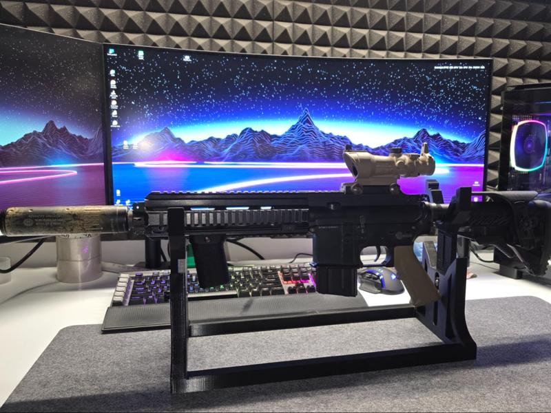 Adjustable gun holder
