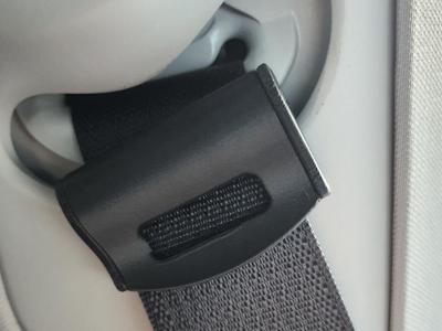 Seatbelt adjuster