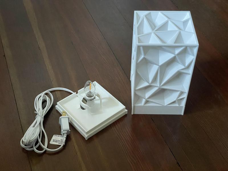 Crinkle lamp base for clip-in accessory bulb