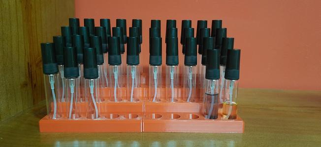 Perfume spray glass bottle holder