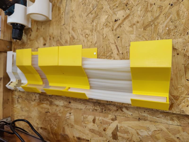 Glue stick holder with screw holes