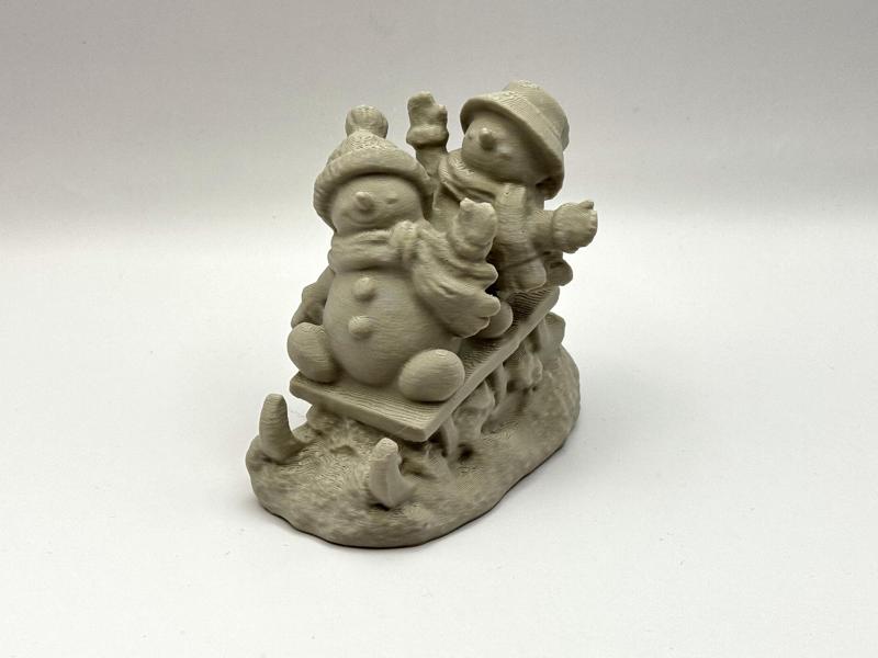 Snowman on Sled