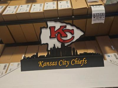 kansas city Chiefs with the skyline of kansas NFL 
