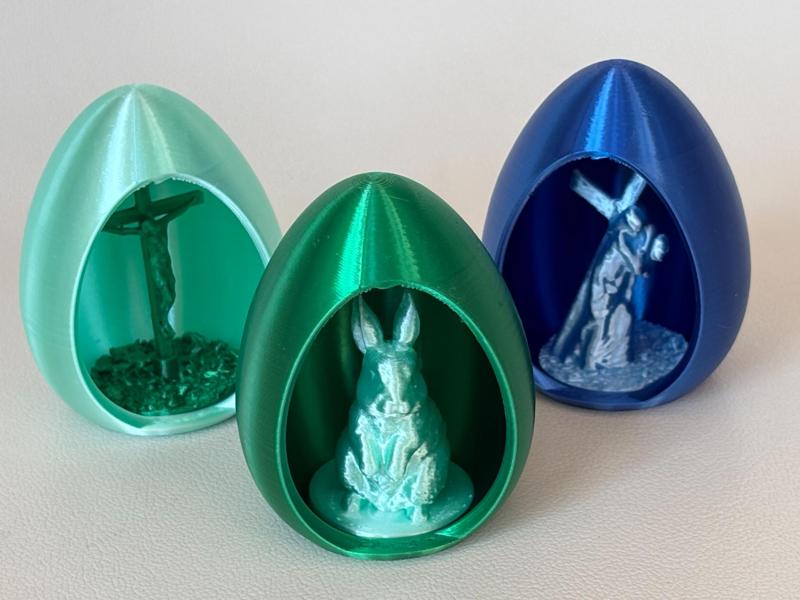 Easter egg with interchangeable inserts
