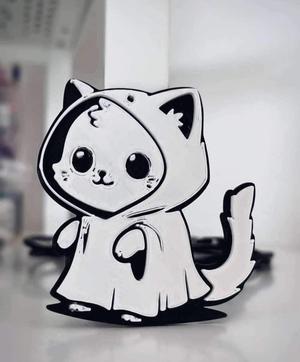 Cute cat in ghost costume