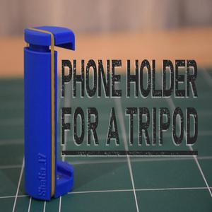 Phone holder attachment for a tripod 