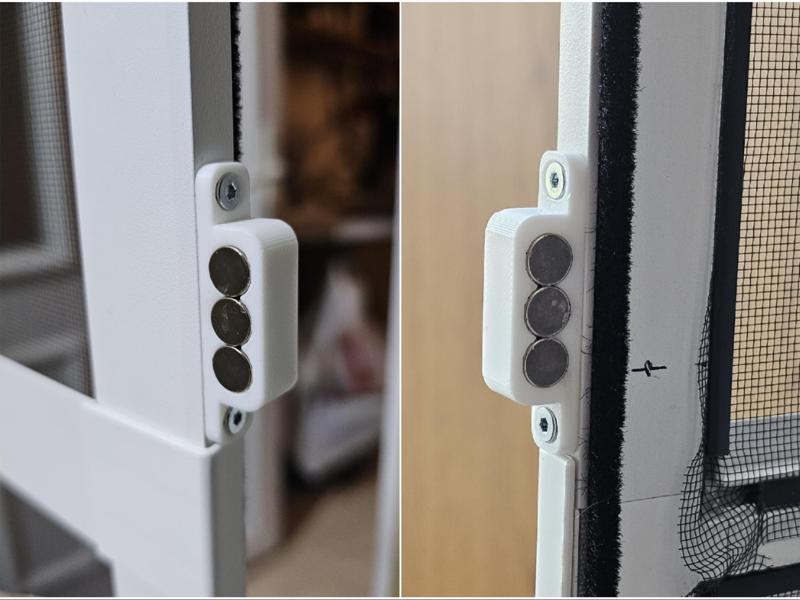 Two-sided magnetic door catch