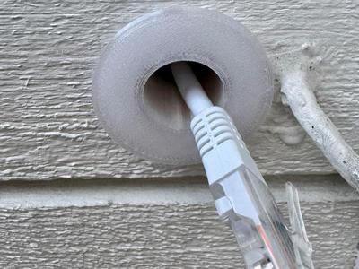 Wall passthrough for cables - adjustable length