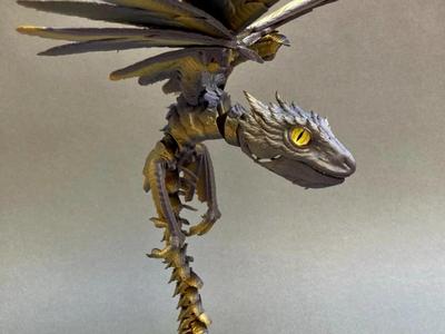 Finger-biting feathered dragon with wings {hinge}