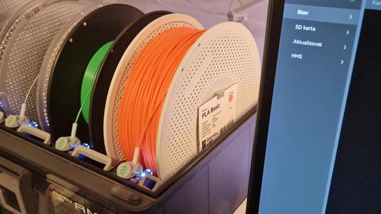 Filament label holder on the spool.