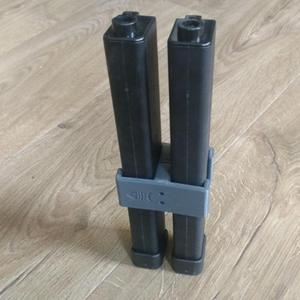 Dual magazine clamp for ARP-9