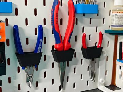 Skadis holder for pliers, and similar tools.