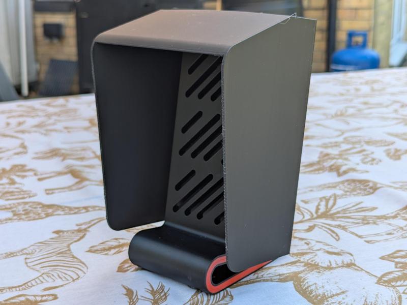 Mobile phone stand with removable sun shade