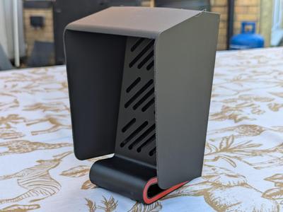 Mobile phone stand with removable sun shade