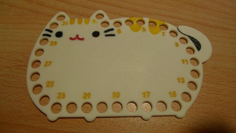 Pusheen cross stitch thread organizer