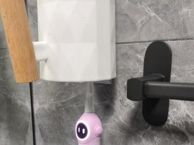 Smiling toothbrush and cup holder