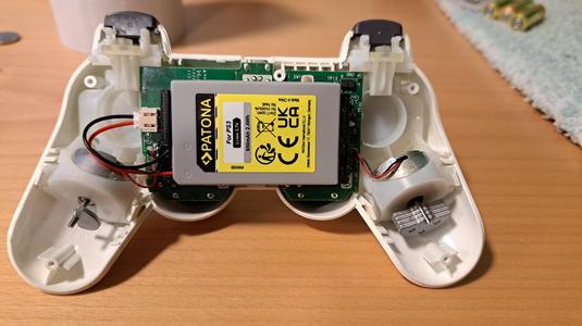 PS3 controller battery bracket