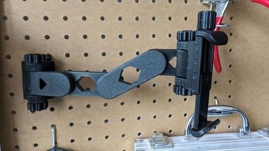 Adjustable Pegboard Phone Holder