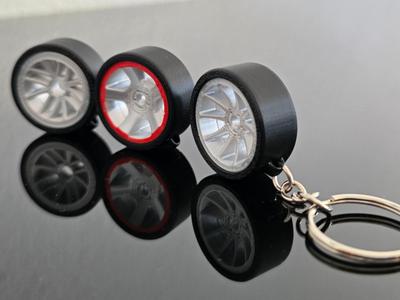 Car rim with tire keychain
