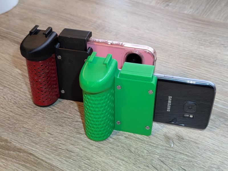 Mobile Phone Camera Grip with Spring-Loaded Mechanism