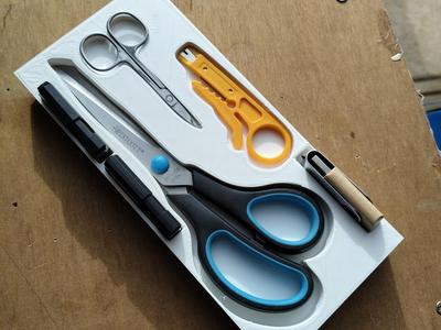 Scissor, pendrive, wire stripper drawer insert
