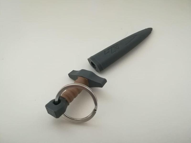 Weed marijuana keychain carrying sword