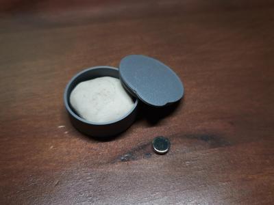 Mini dustproof storage box with built-in magnet