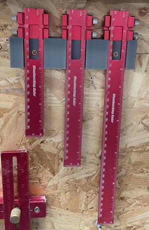 Holder for sliding ruler set wall mount