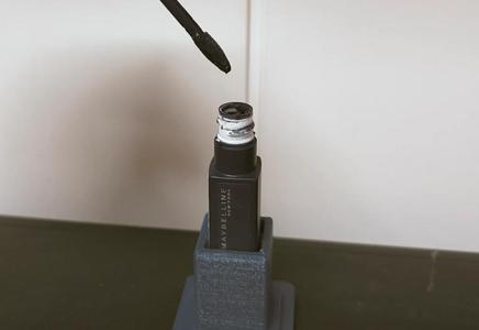 Soporte unimanual para pintalabios antigoteo