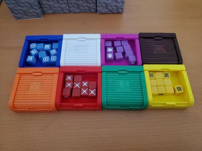 Folding box with sliding tray