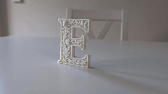 Standing Letter E in a Gypsum Floral Style