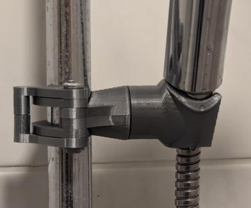 Quick-lock shower head holder for 18-25 mm rails