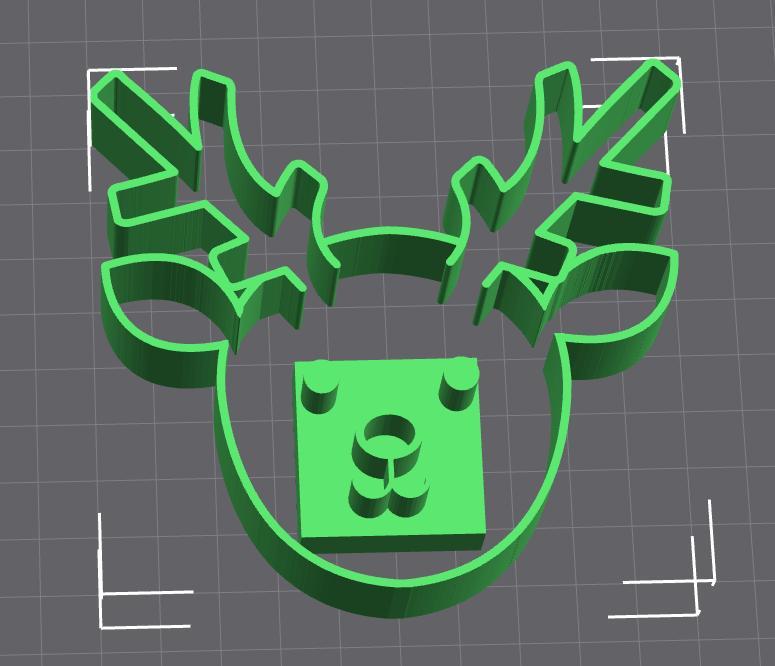 Create festive cookies with the reindeer and its face features!