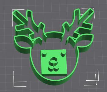 Create festive cookies with the reindeer and its face features!