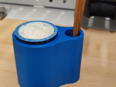 Grease can with brush holder