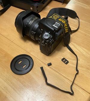 Nikon Lens Cap Holder for 52 and 77 mm Lens Caps - Fits Camera Strap