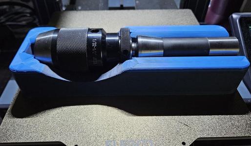Keyless drill chuck with JT33 to r8 adapter affixed. 