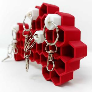 Wall-Mounted Honeycomb Key Organizer with Stylish Keychain Elegance