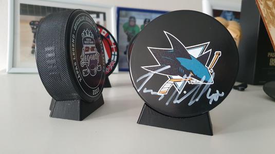 Hockey puck stand