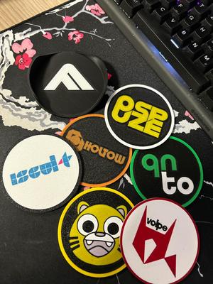 The Finals Official Sponsor and CBI Sponsor Coasters with coaster holder