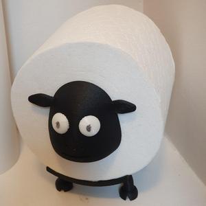 A Sheep thats a spare toilet roll holder