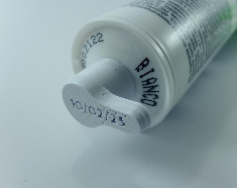 Silicone cartridge cap with parametric date (Freecad)