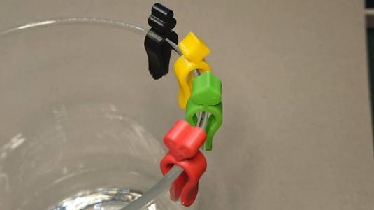 Drink markers themed with playing card suits