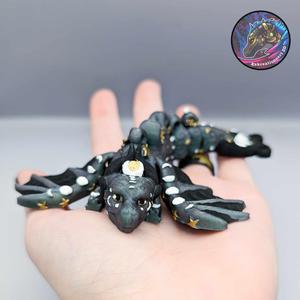baby flexi lunar dragon keychain