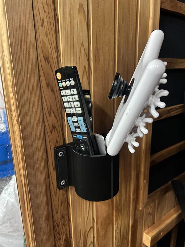Wall mounted cup holder